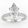 White gold marquise cut diamond engagement ring in a pave setting
