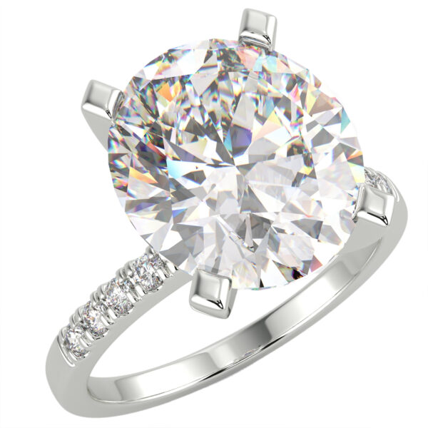 White gold oval cut diamond engagement ring in a pave prong setting