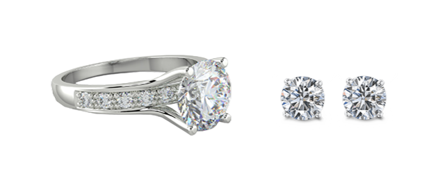 Diamond engagement ring and a pair of diamond earrings